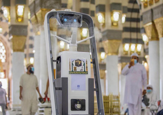 Smart robot used for hygiene and crowd safety during Hajj 2025 in a mosque, reflecting modern technology in pilgrimage management